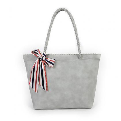 Faux Leather Tote Bag Featuring Striped Bow Accent..
