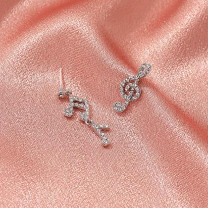 Diamond Earrings With Jumping Notes And Asymmetric..