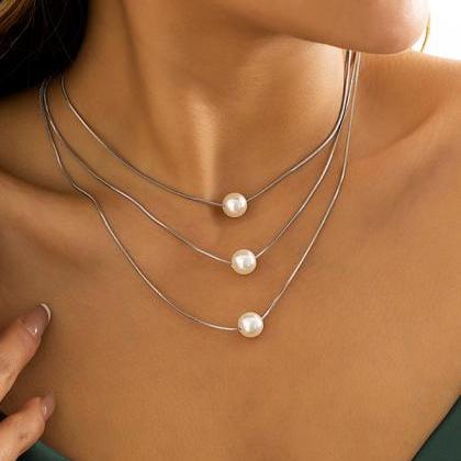 White Simple Multilayer Pearl Necklaces..