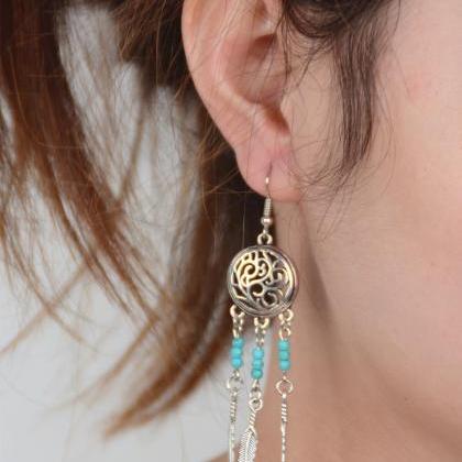 Hollow Out Totem Metal Feathers Tassel Earrings