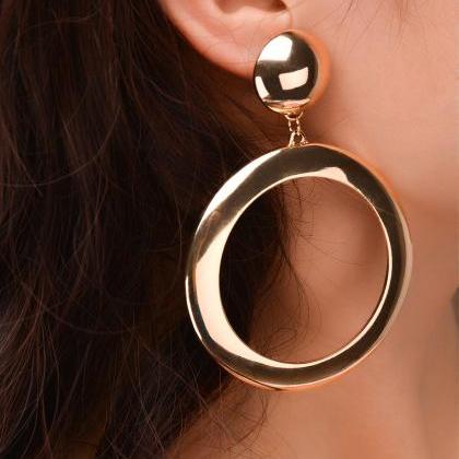 Seiko Lens Geometry Circular Earrings