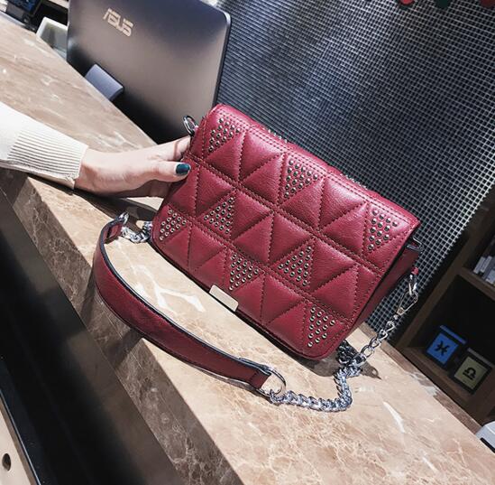 Quilted Lining Rivet Chain Crossbody Bag