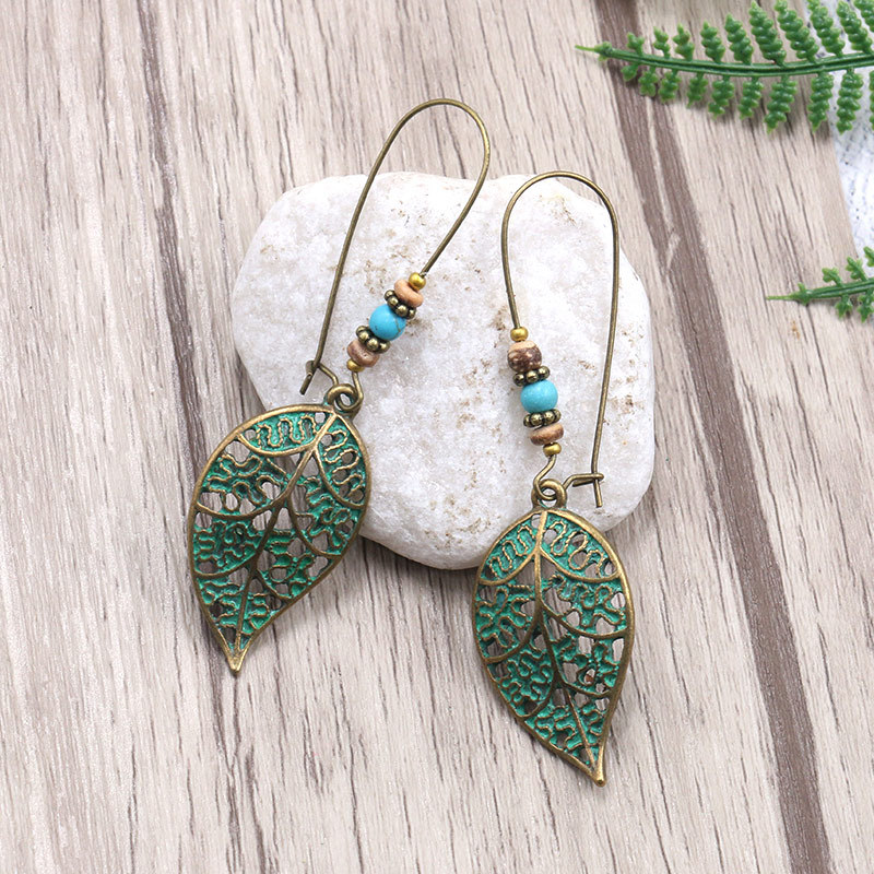 Metal Earrings With Hollow Leaves And Ears-1